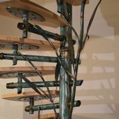 escalier fer forger colimacon sculpter eclairage led bois auvergne rhone alpes cantal