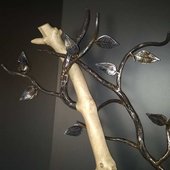 sculpture fer forger branche et feuilles sur bois flotter auvergne rhone alpes cantal