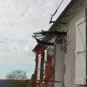 marquise fer forger et verre eclairage led auvergne rhone alpes cantal