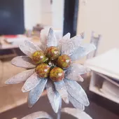 sculpture fer forger fleur d'edelweiss auvergne rhone alpes cantal